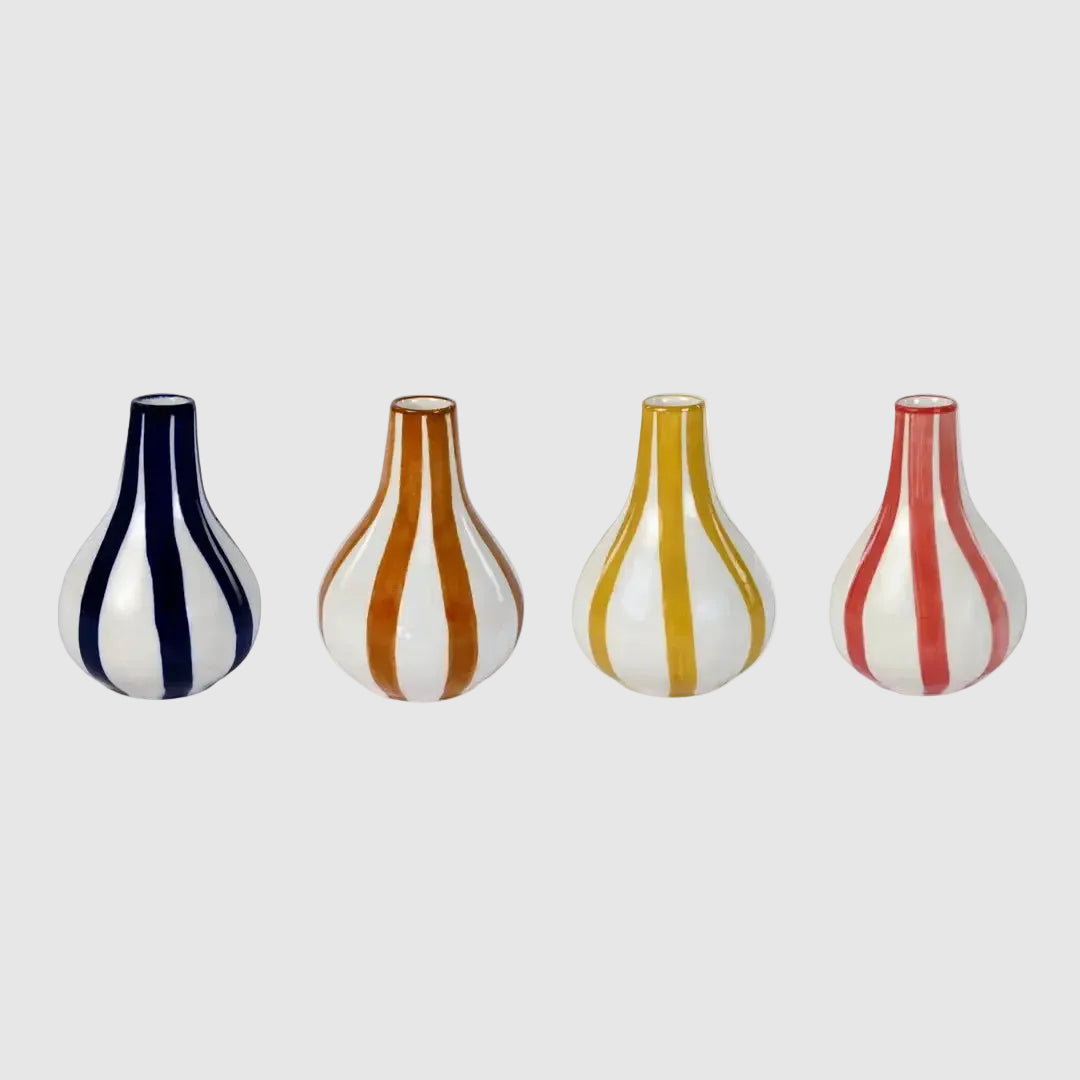 Four striped vases in different colors on a white background